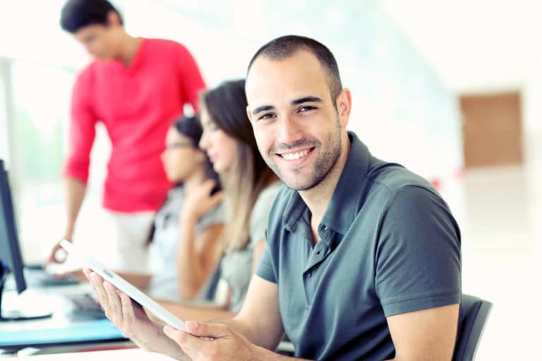 adult smiling for education