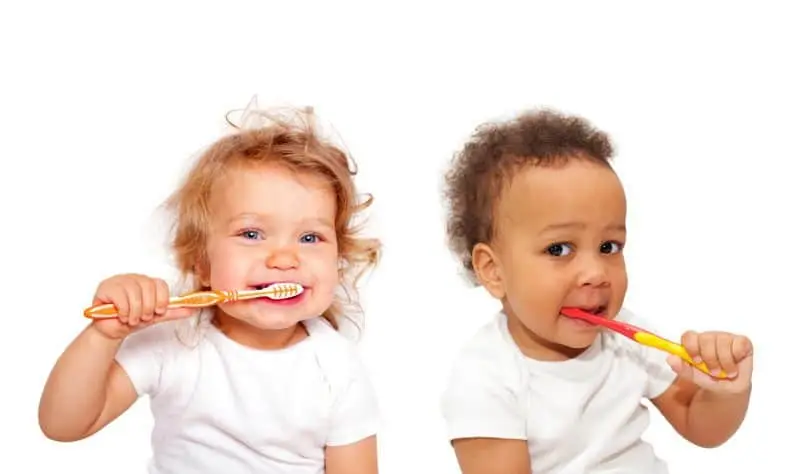 baby toddlers brushing teeth