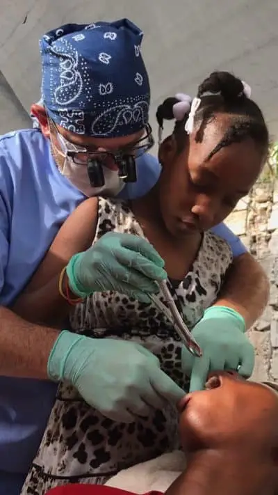 Dr Fussell Teaching Dental Care Haiti